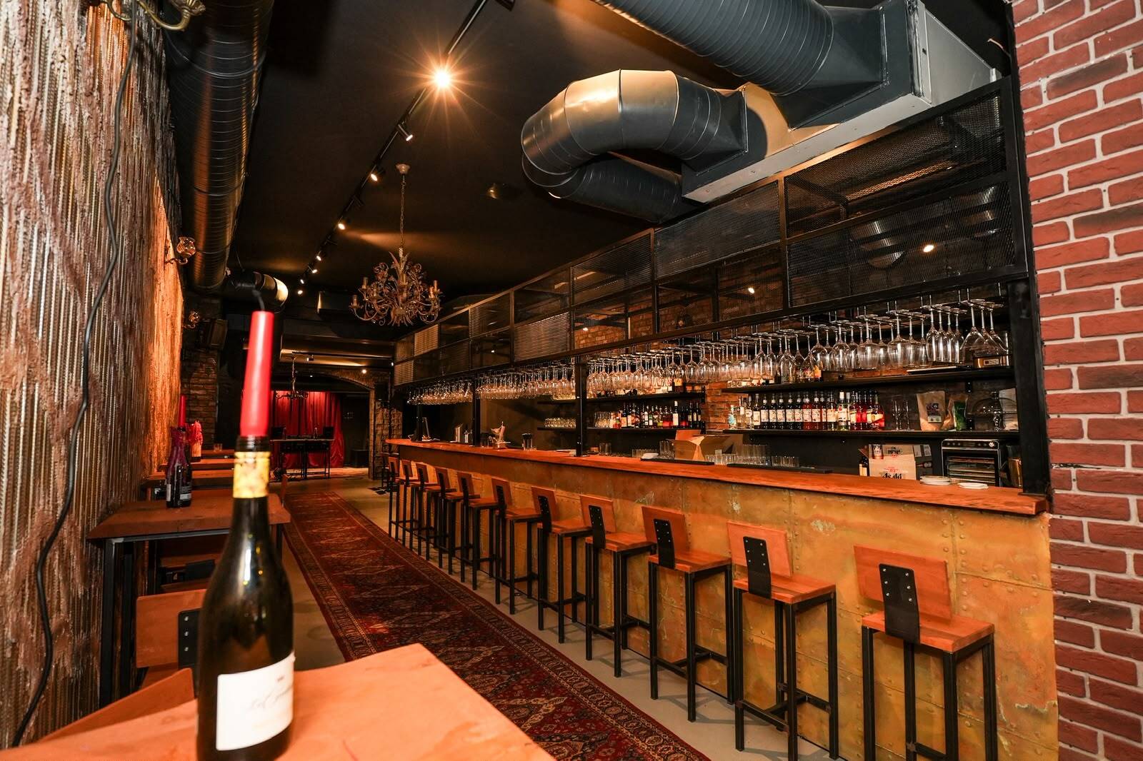 Dimly lit bar interior at Drinkhall Venue